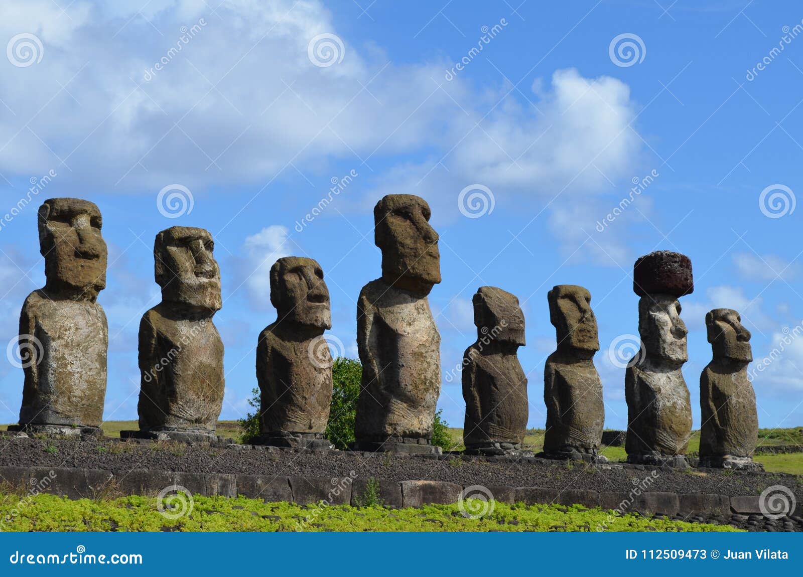 moais in the ceremonial platform ahu at tongariki beach, rapa nui easter island