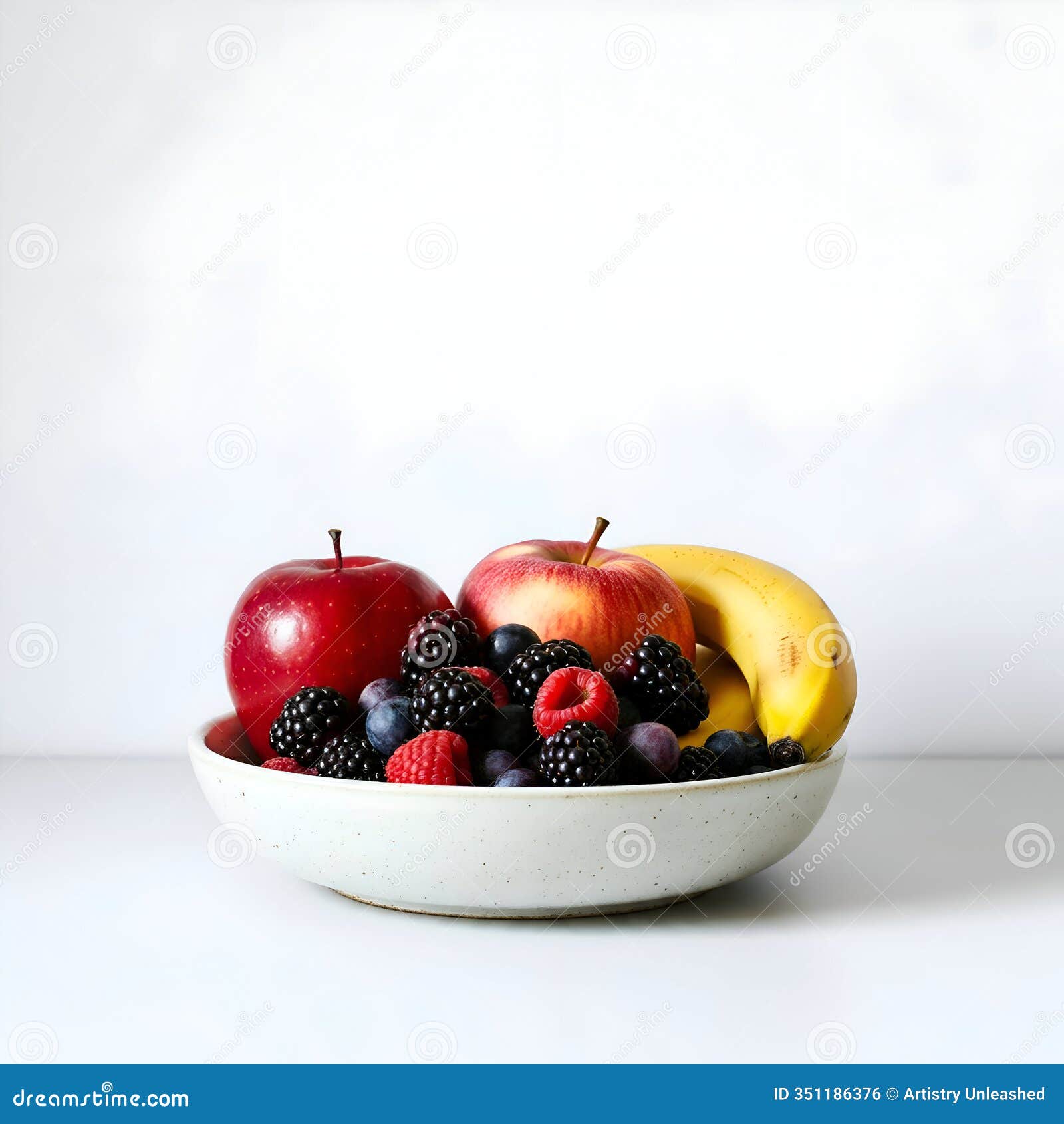 ai-generated: bowl of red apples, banana, blackberries, raspberries, and blueberries