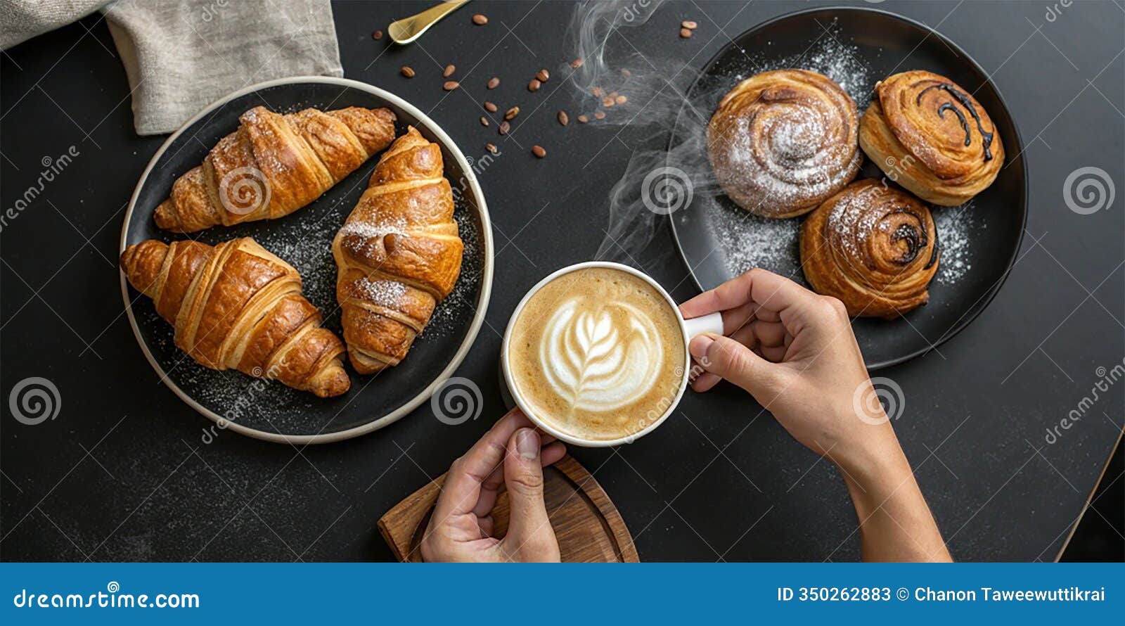 hands holding latte beside croissants on black table - ai-generated breakfast art