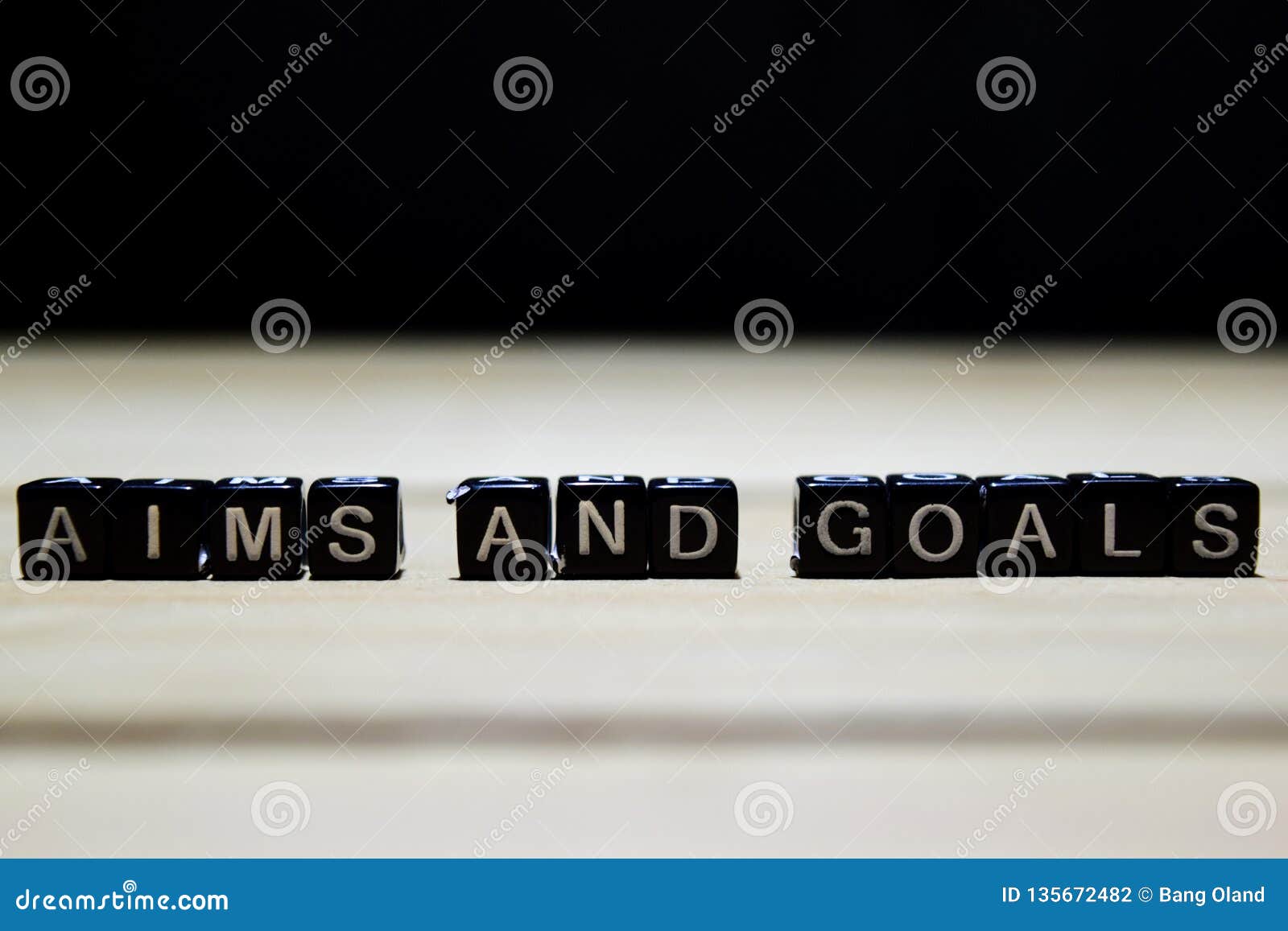 aims and goals concept wooden blocks on the table.