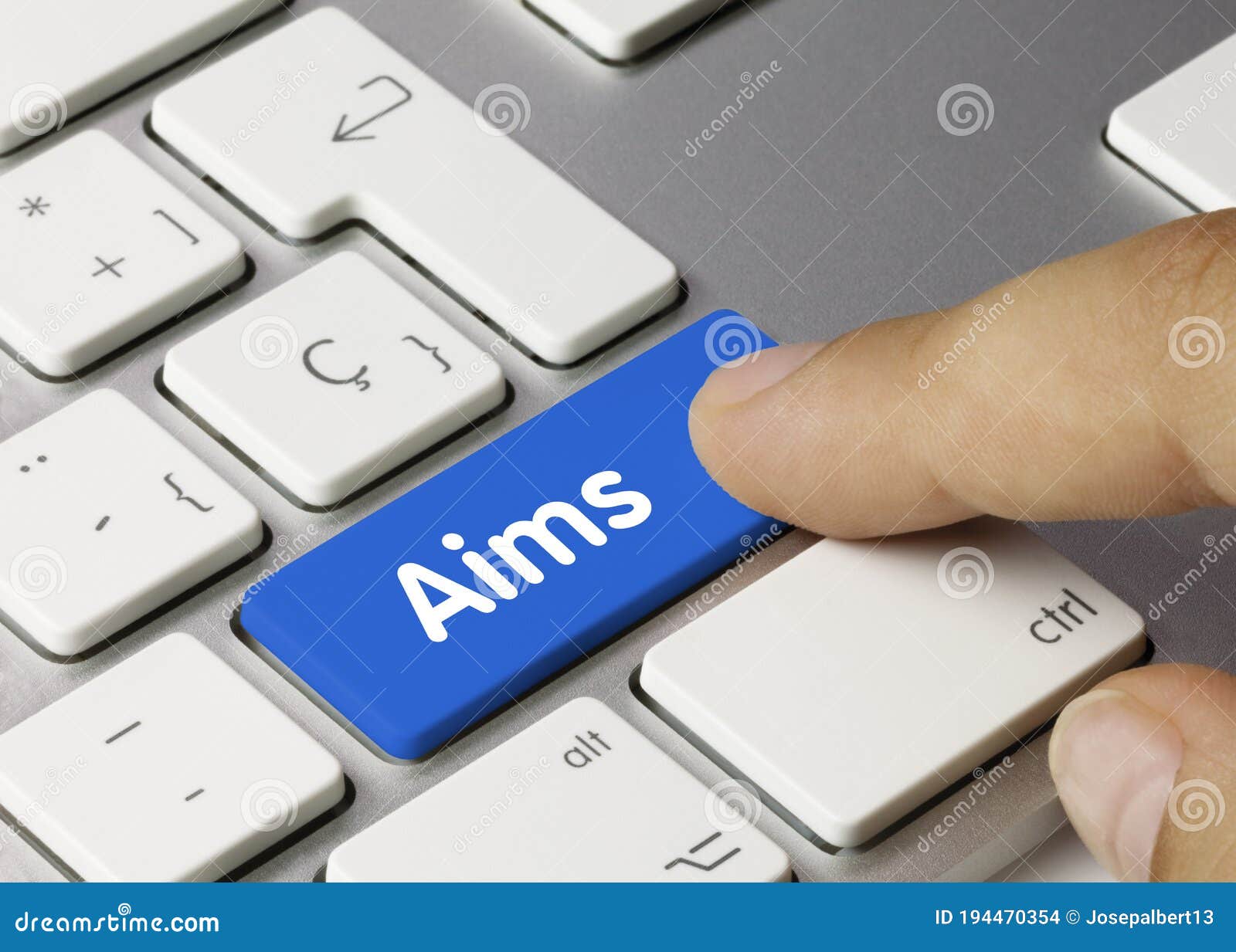 aims - inscription on blue keyboard key