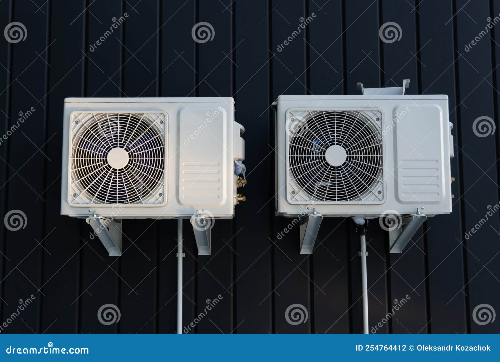 Air Conditioner Compressor on a Dark Wall. Stock Photo Image of unit