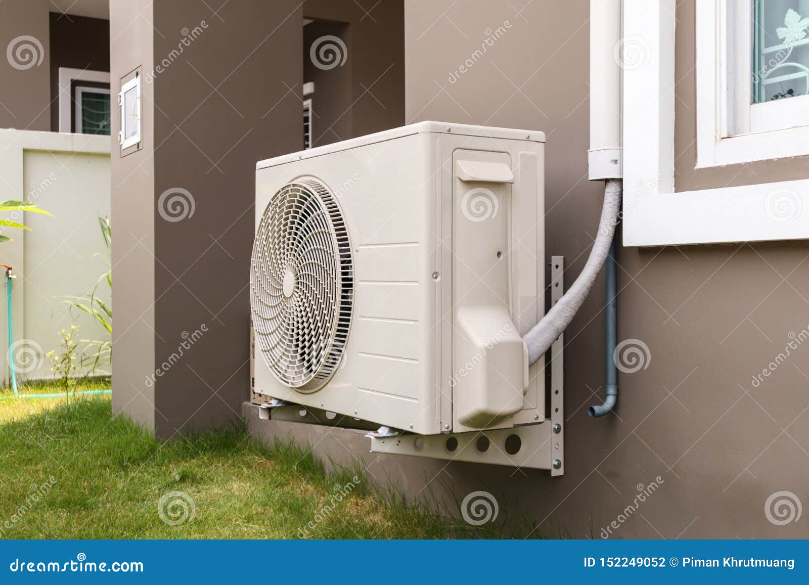 Air Conditioner Compressor Outdoor Unit Installed Outside Stock Photo