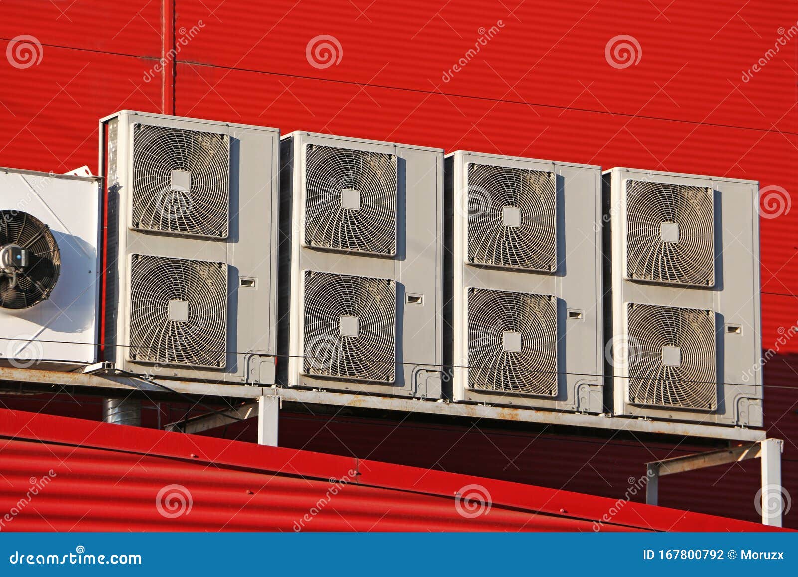 air conditioner devices on red wall - supermarket air conditioner