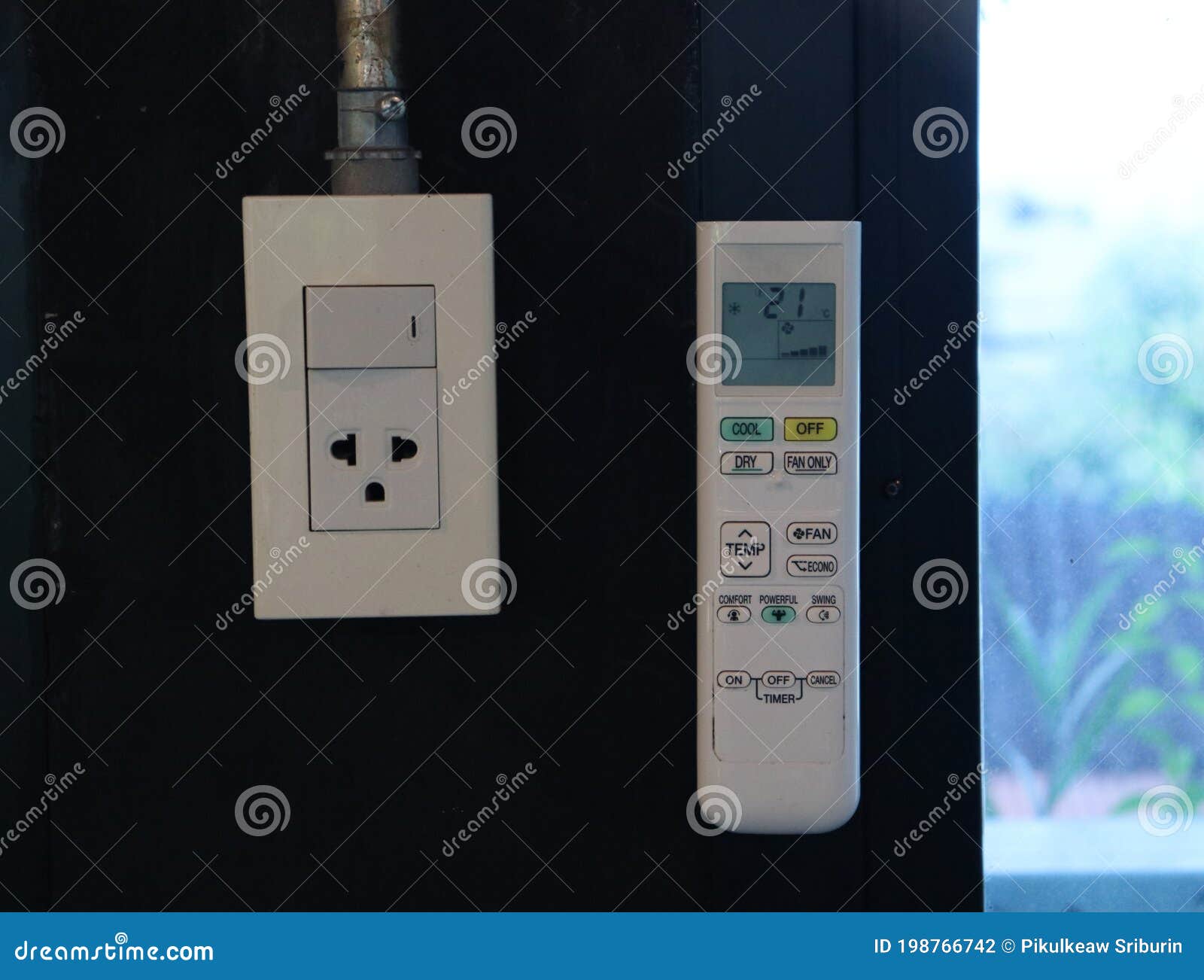 Air Conditioner Remote Control and Light Switch Stock Photo Image of