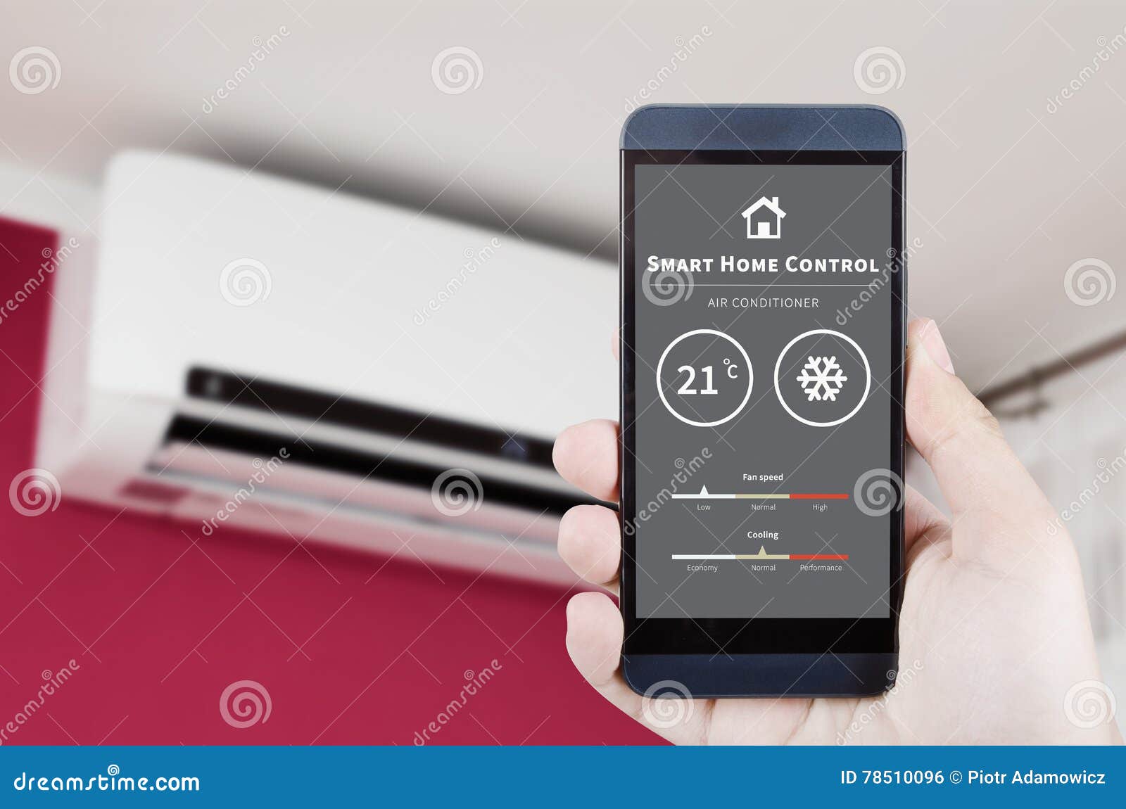 Air Conditioner Remote Control with Smart Home System. Stock Photo