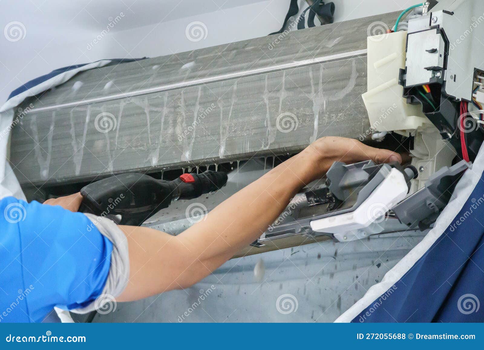 Air Conditioning Cleaning Service with Water Spray Stock Photo Image