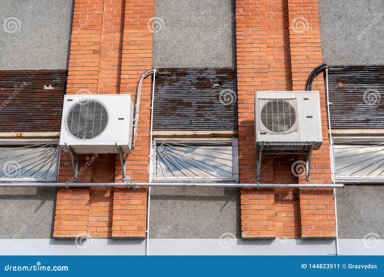 Air Conditioning System on a Building Wall Stock Image Image of cage
