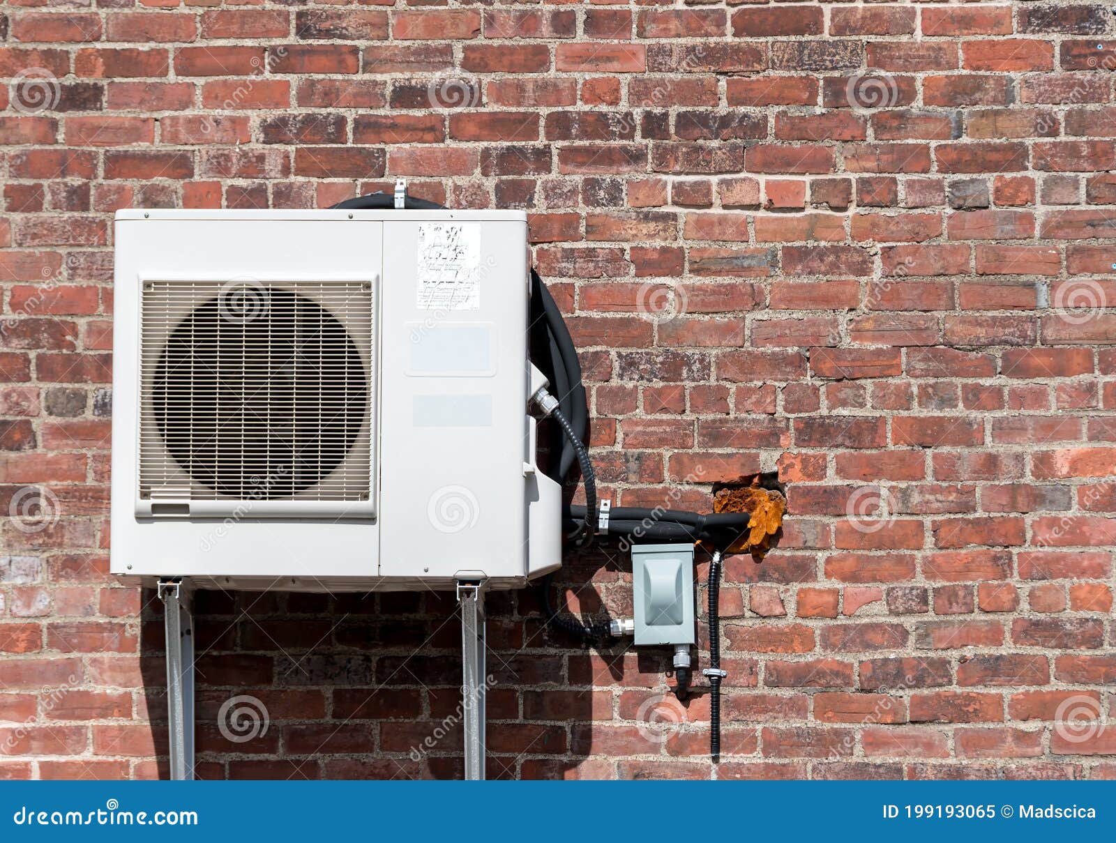 An Air Conditioning Unit on an Old Brick Wall Stock Image Image of