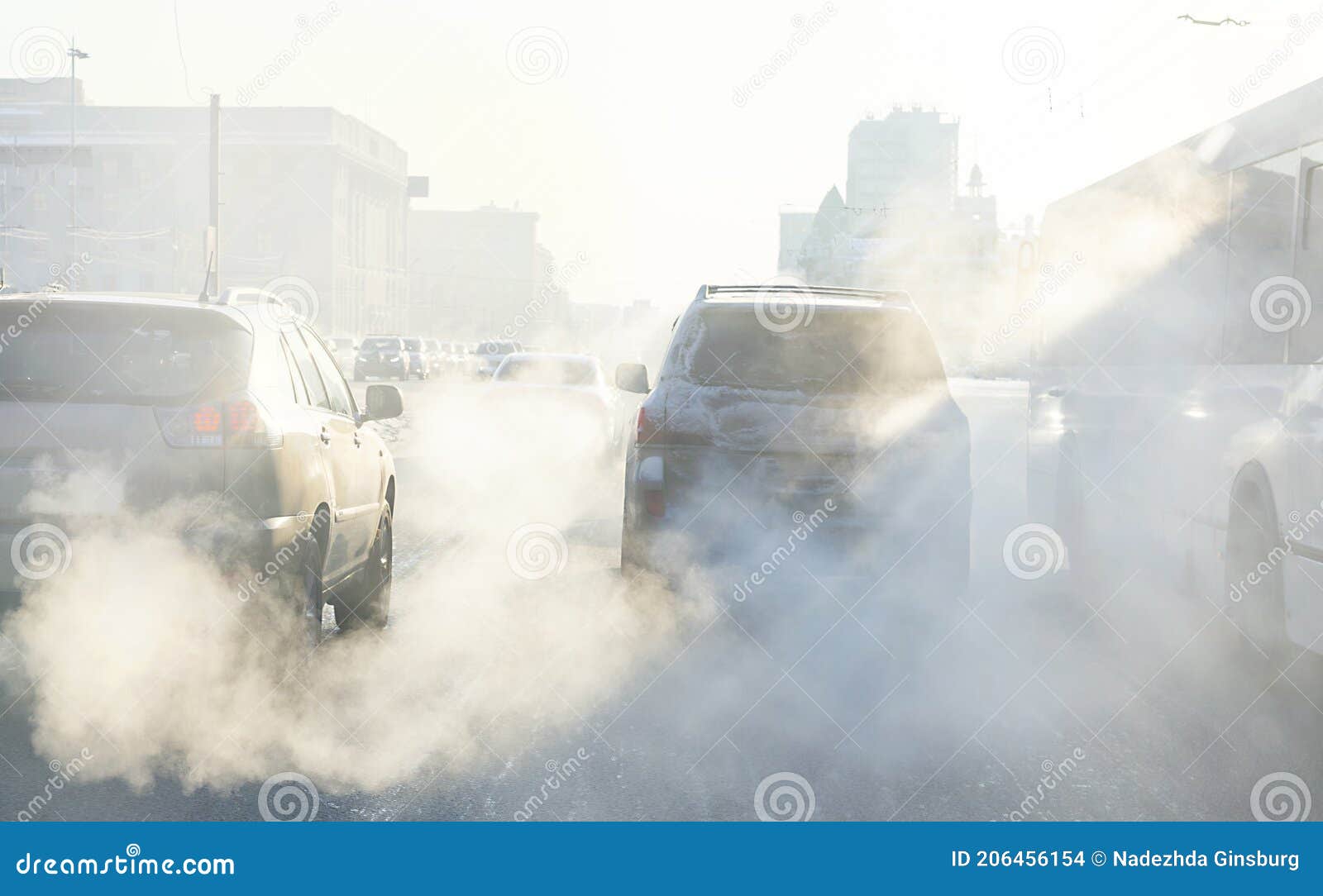 Air Pollution from Exhaust Fumes from Cars in the City, on a Cold Day ...