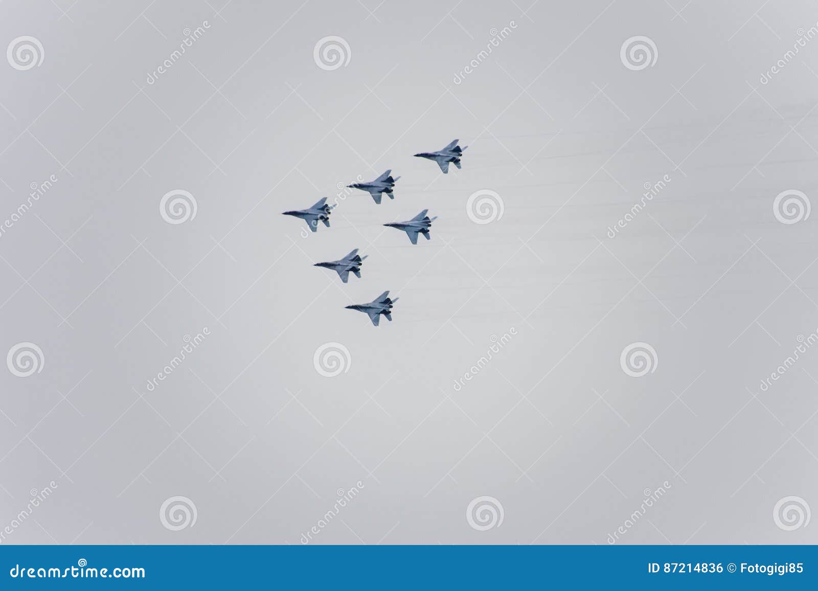 air show in the sky above the krasnodar airport flight school. airshow in honor of defender of the fatherland. mig-29 in the sky.