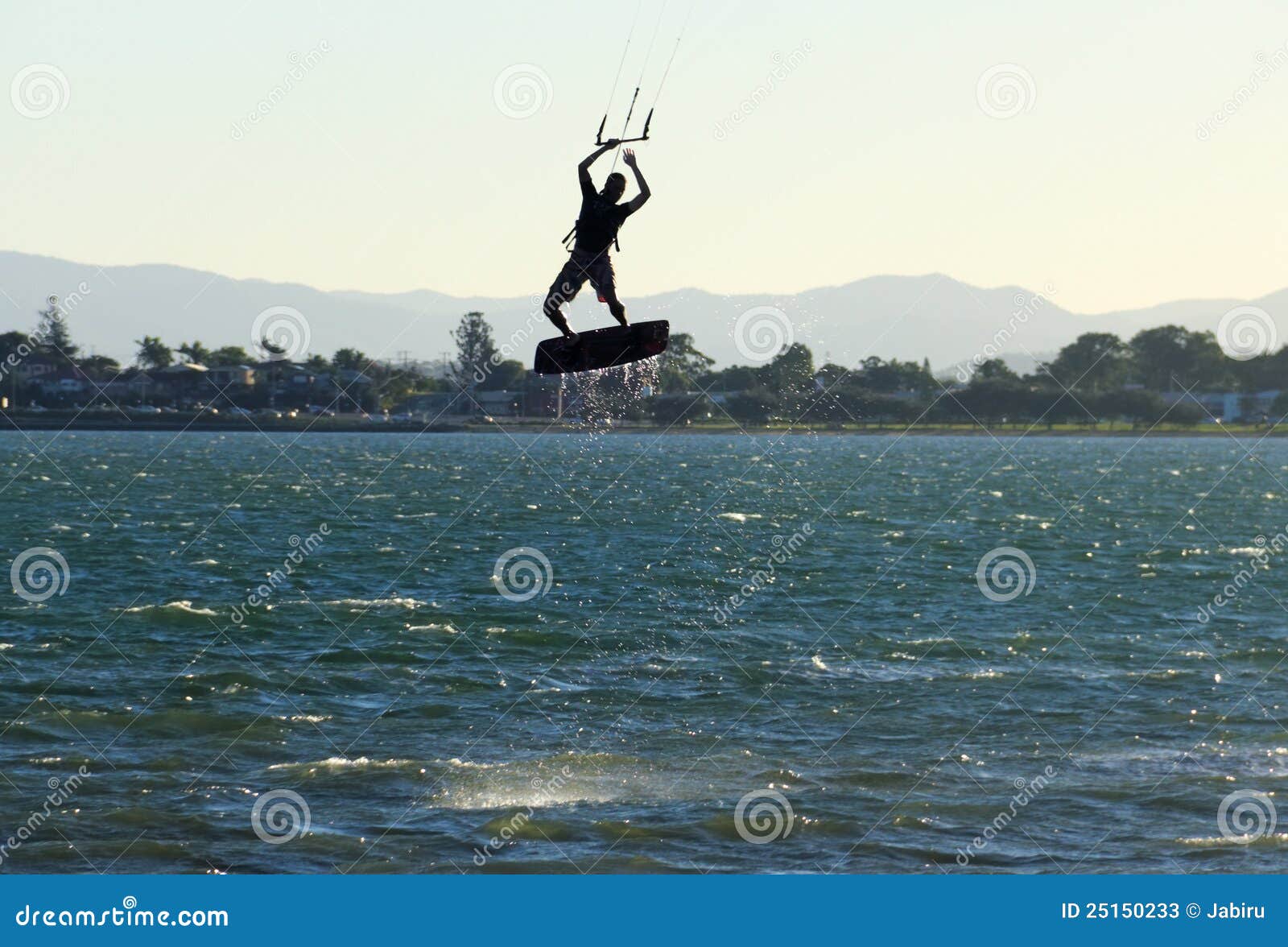 airborne kite surfer