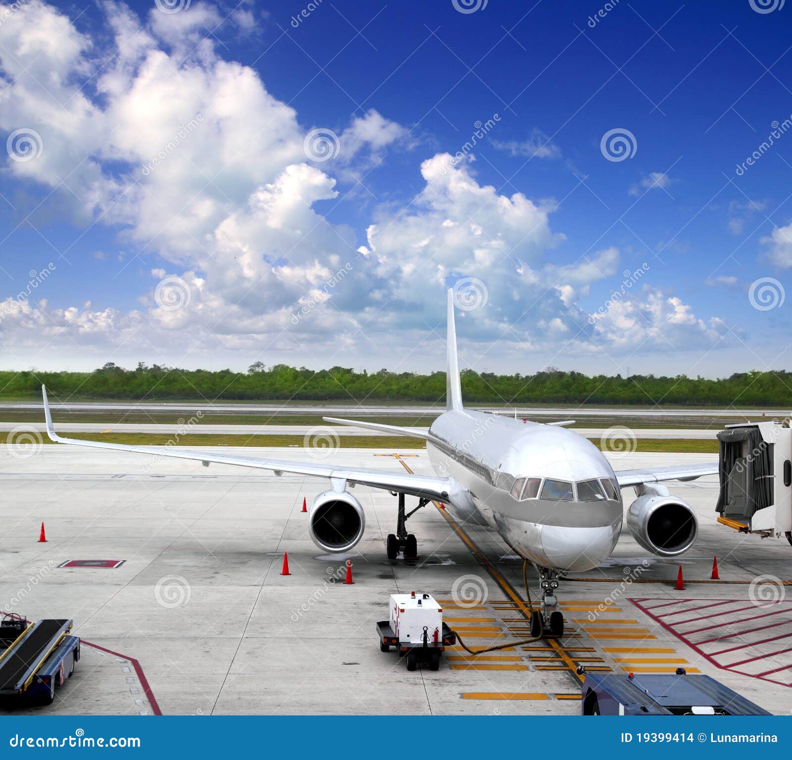 aircraft airplane plane landed airport blue sky