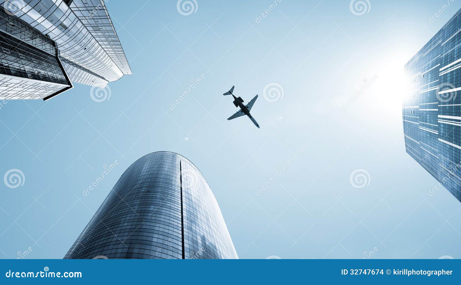 aircraft flying over skyscrapers