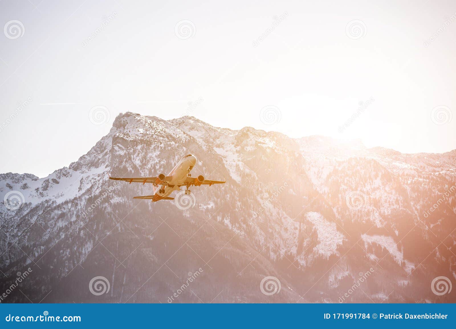 airplane scenery:  take off from airport, mountain range in the alps. travel by air, transportation