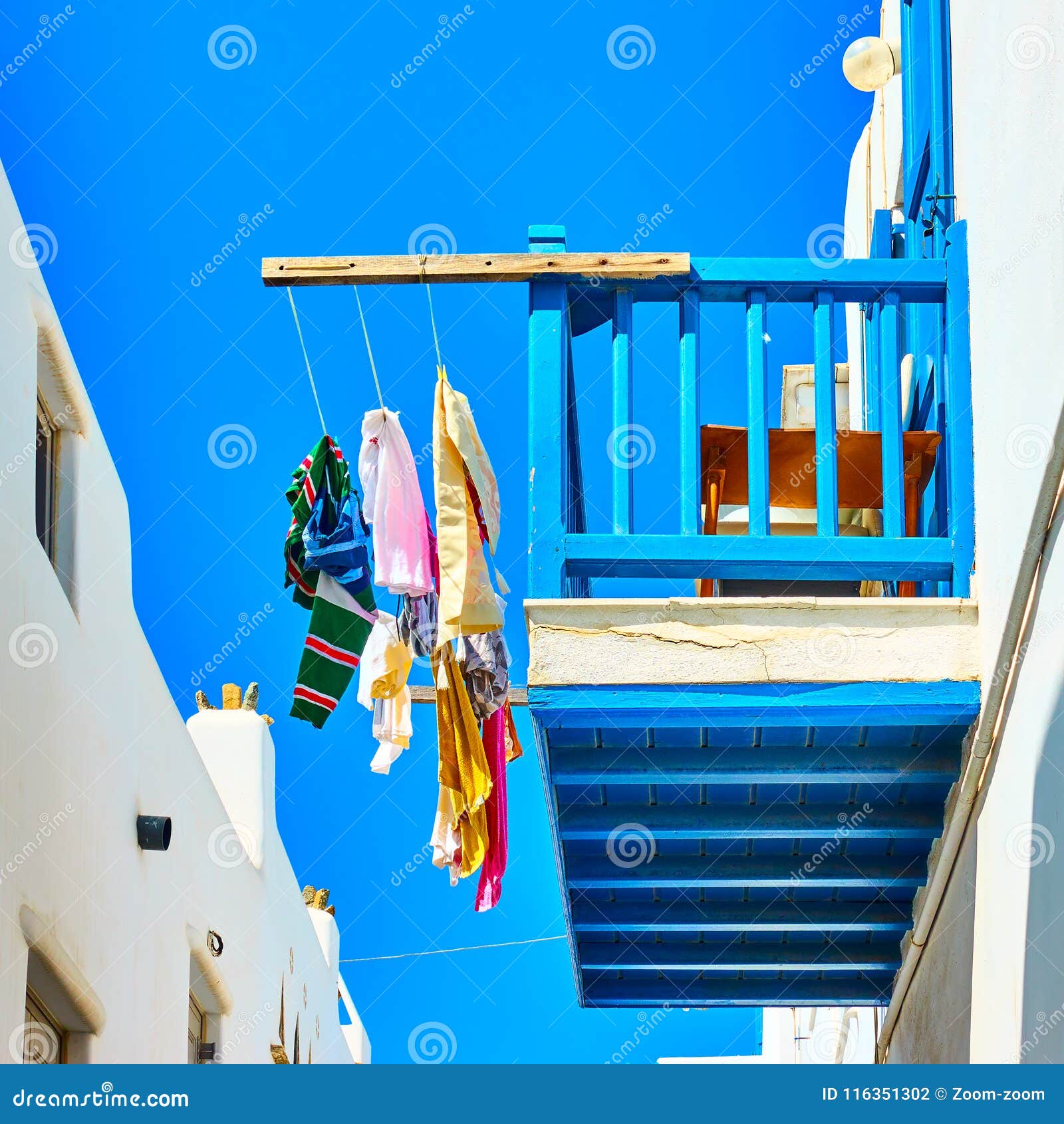airing clothes on a balcony