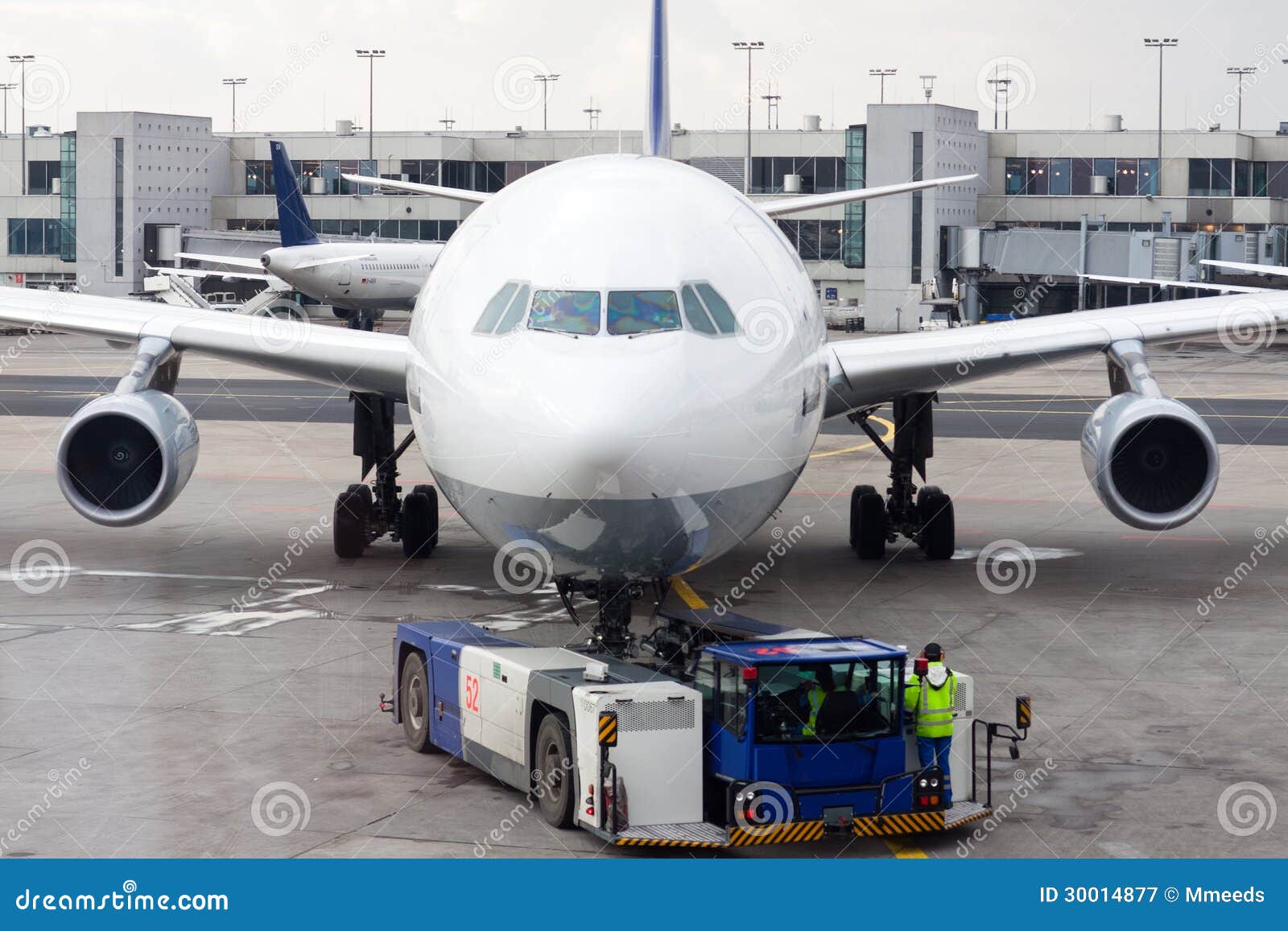 an airplane at airport on tarmac