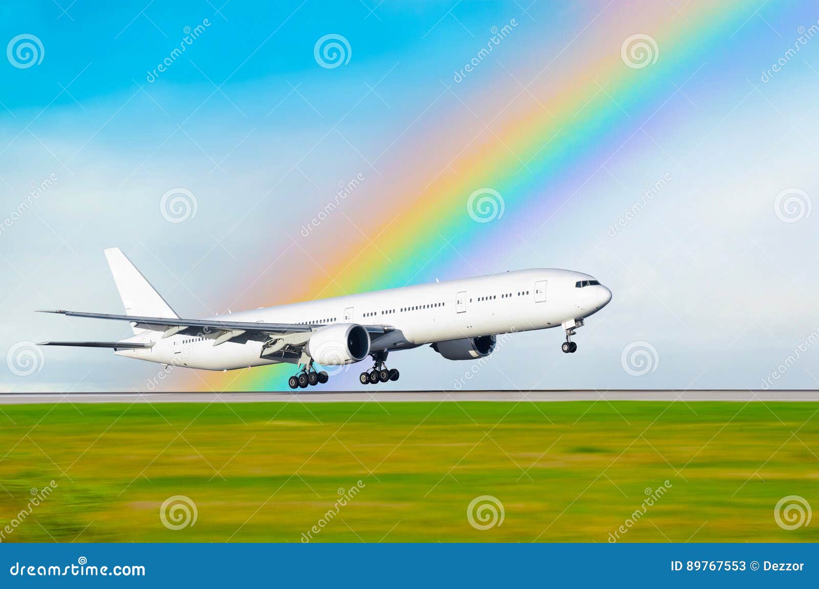 The Airplane on the Background of the Rainbow Landed at the Airport