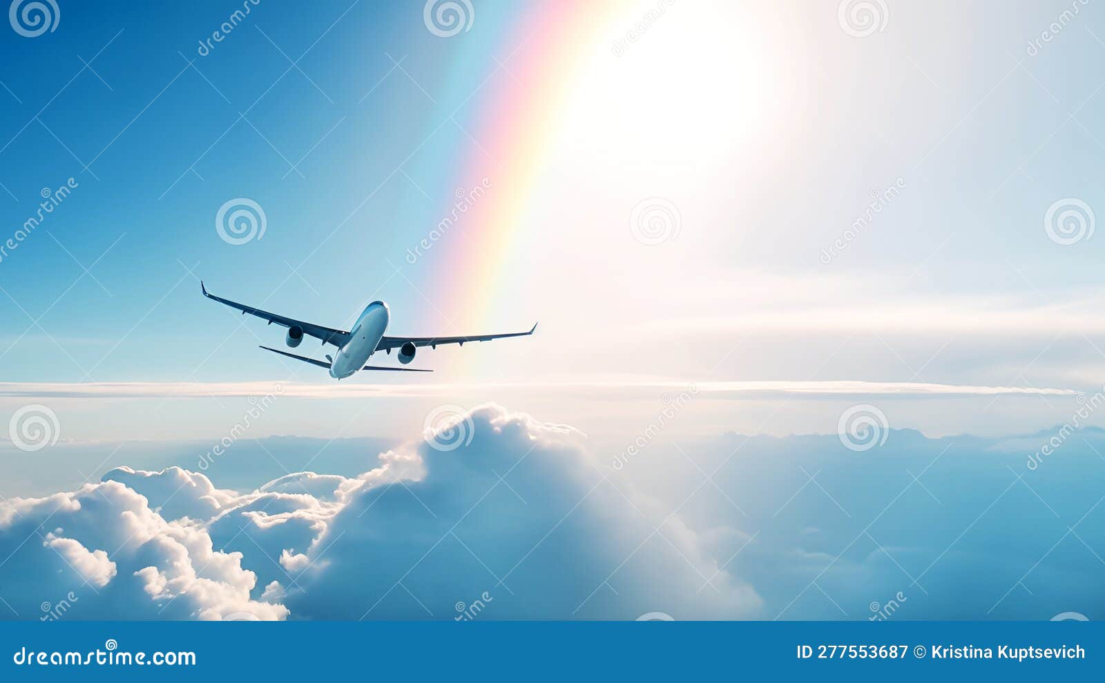 airplane flying above amazing clouds in clear blue sky with rainbow and sun raies