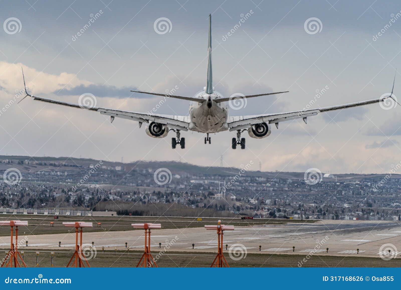 airplane jetliner arriving at airport runway