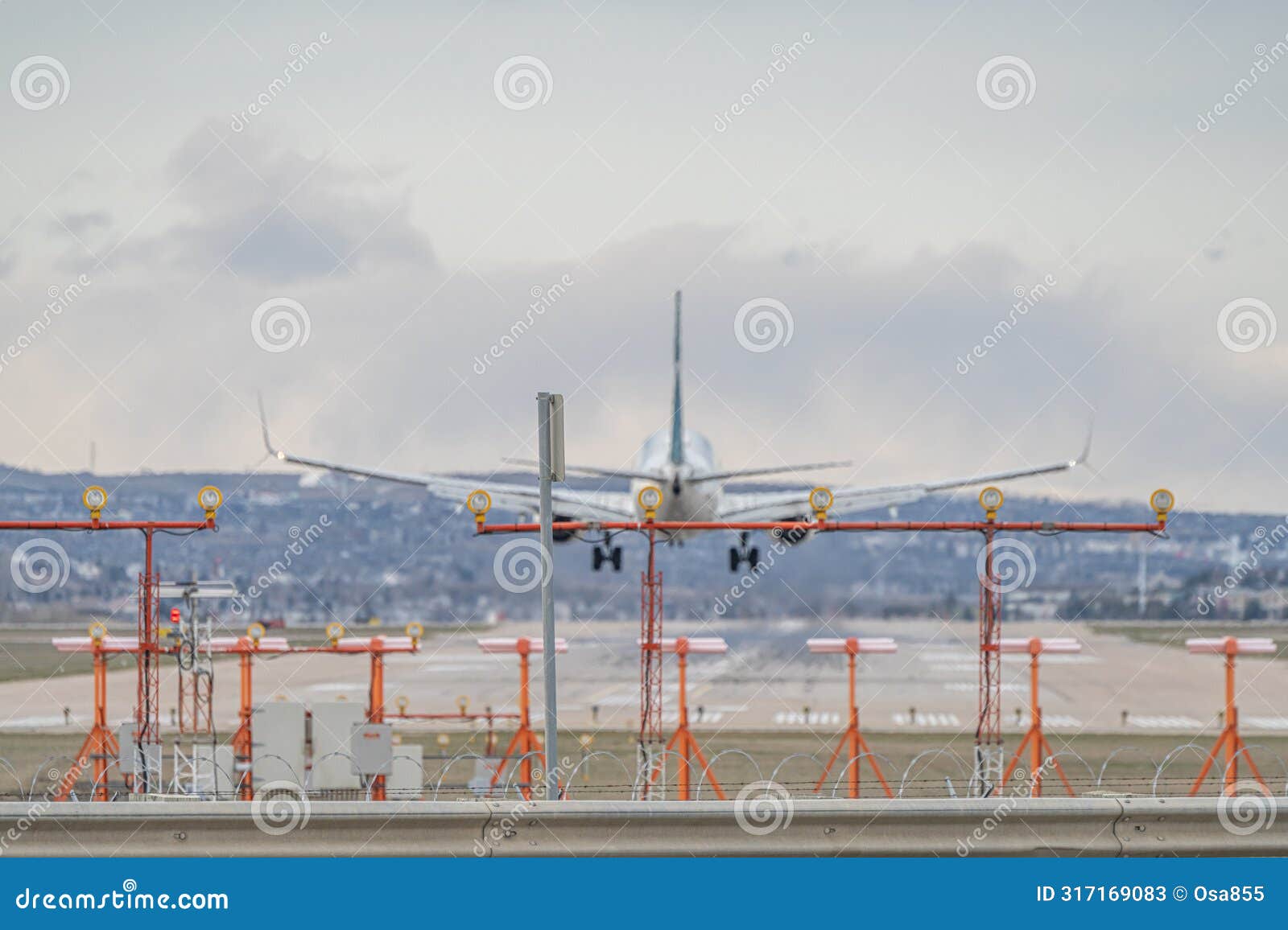 airplane jetliner arriving at airport runway