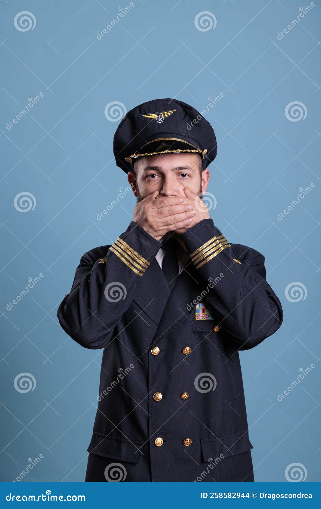 Airplane Pilot Covering Mouth with Hands, Speak No Evil Stock Photo ...