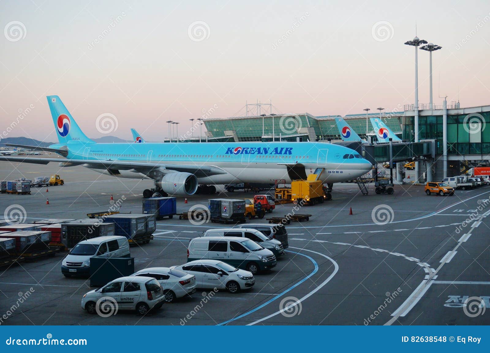 Airplanes at Incheon International Airport ICN in Seoul, South Korea. INCHEON, SOUTH KOREA - Airplanes on the tarmac at Incheon International Airport ICN, the largest airport in South Korea and a hub for Korean and Asiana airlines.