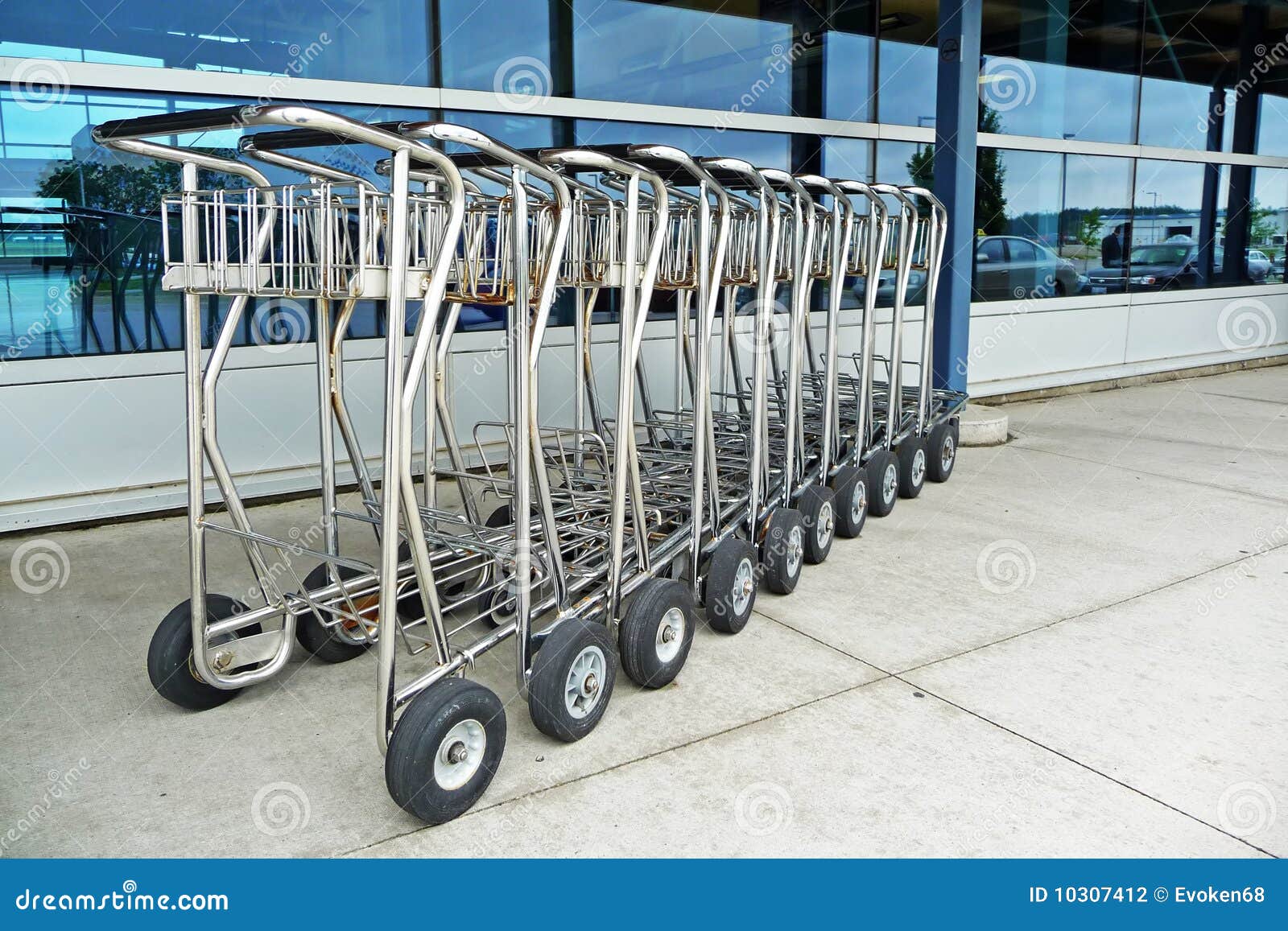 Airport luggage carts stock photo. Image of urban, construction 10307412