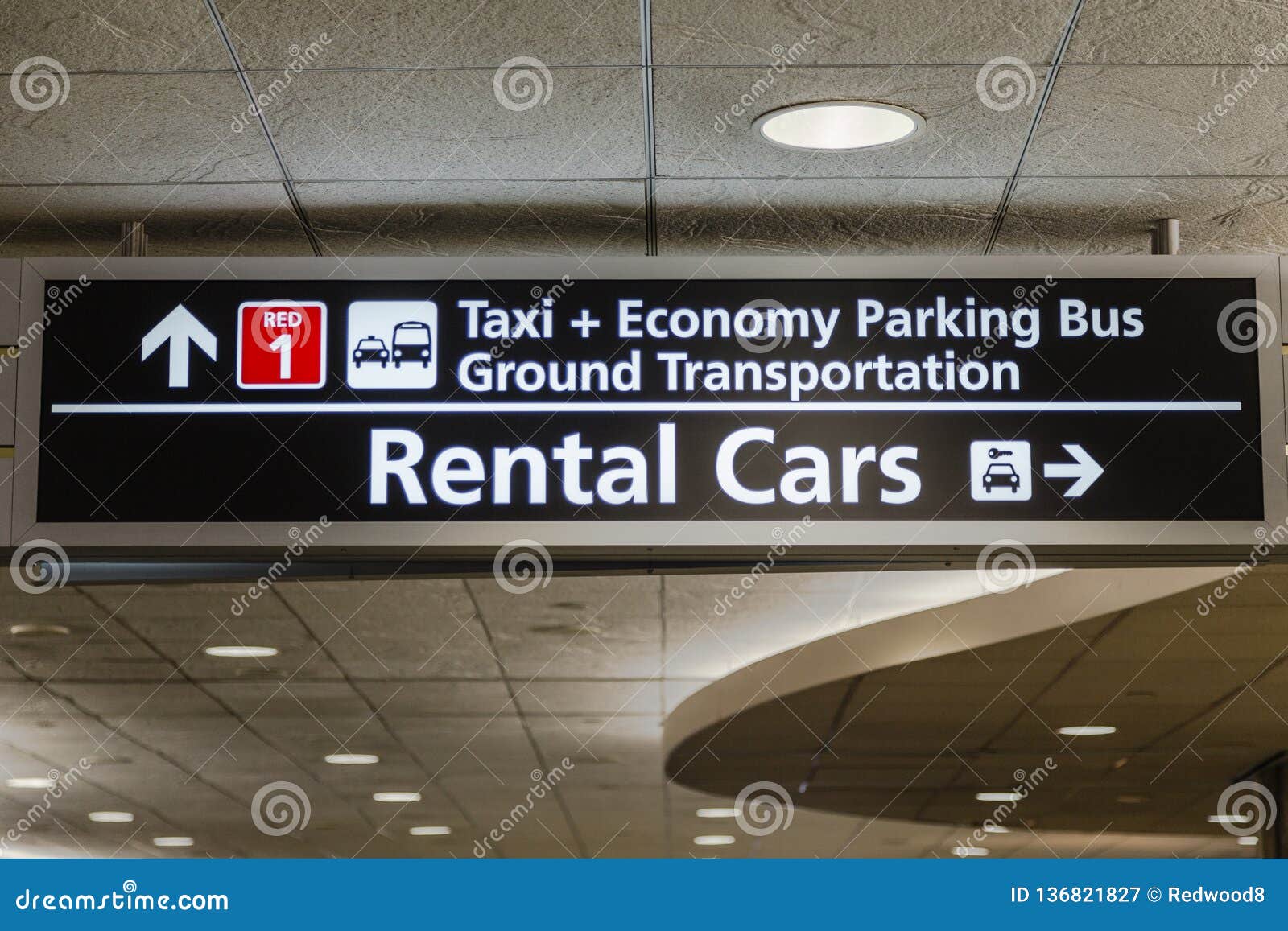 airport rental cars, parking and ground transportation sign