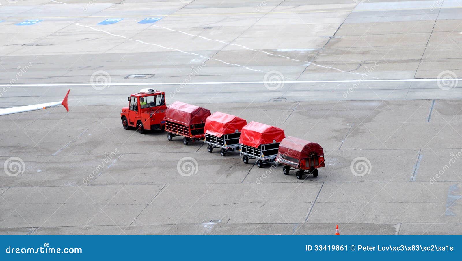 airport trucks handling baggage