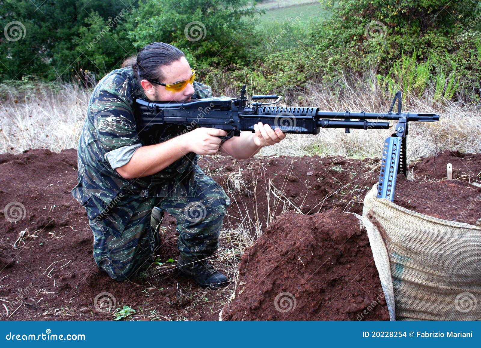 Airsoft Soldier Shooting With M60 Stock Images Image 20228254