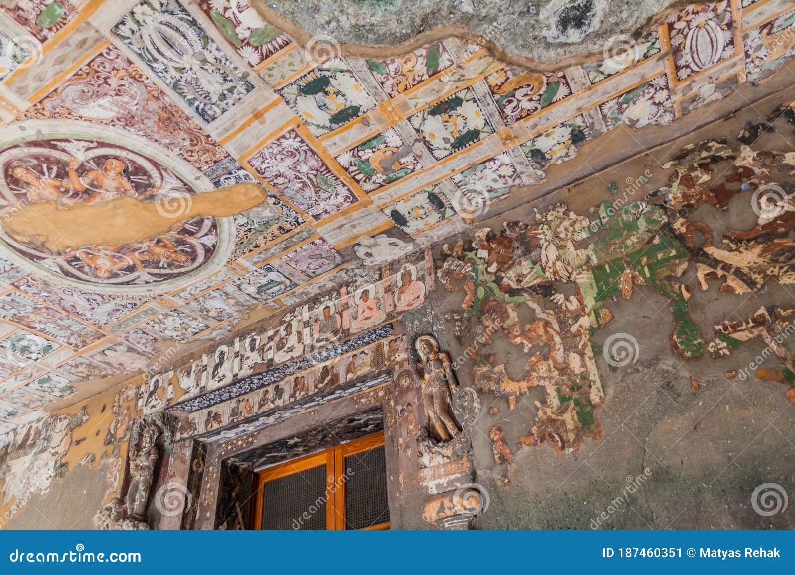 ajanta, india - february 6, 2017: colorfuly decorated vihara (monastery), cave 17, carved into a cliff in ajanta, maharasthra