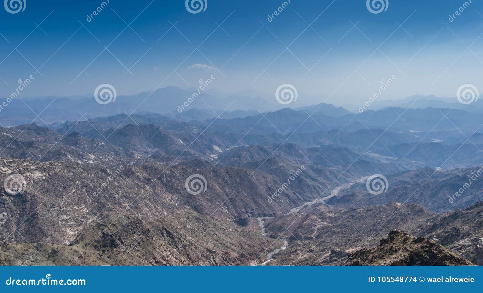 al hada mountain in taif city, saudi arabia with beautiful view of mountains and al hada road inbetween the mountains.
