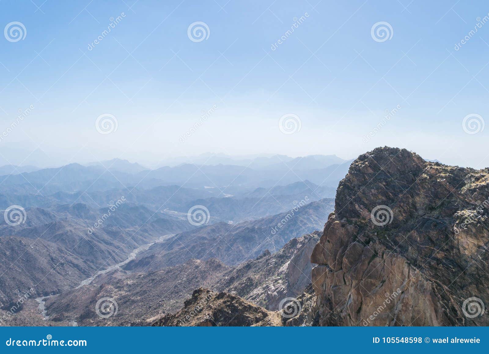al hada mountain in taif city, saudi arabia with beautiful view of mountains and al hada road inbetween the mountains.