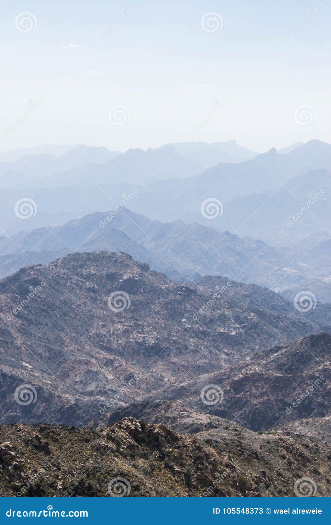 al hada mountain in taif city, saudi arabia with beautiful view of mountains and al hada road inbetween the mountains.