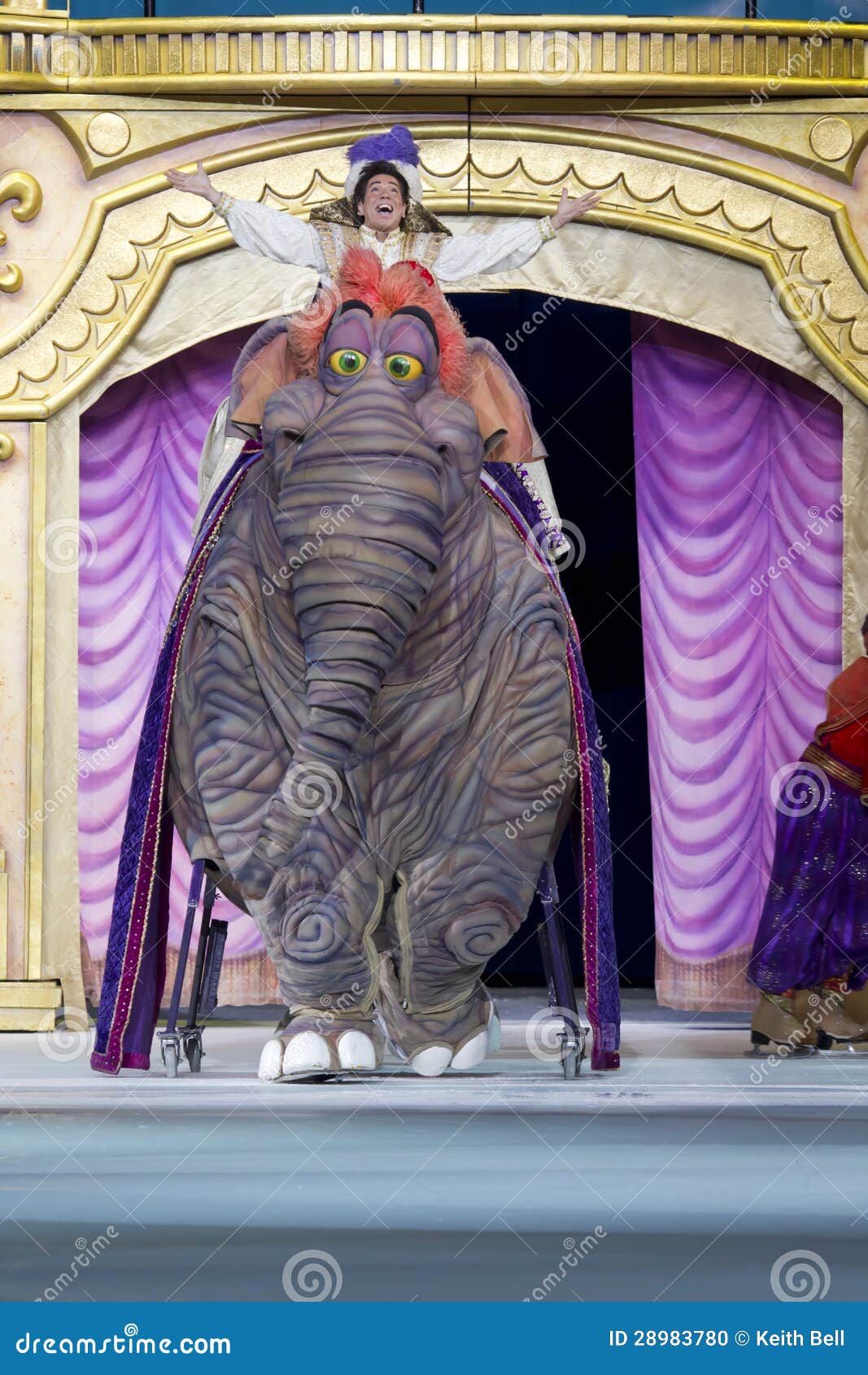 Aladdin with Hands Out Riding an Elephant Editorial Image Image of