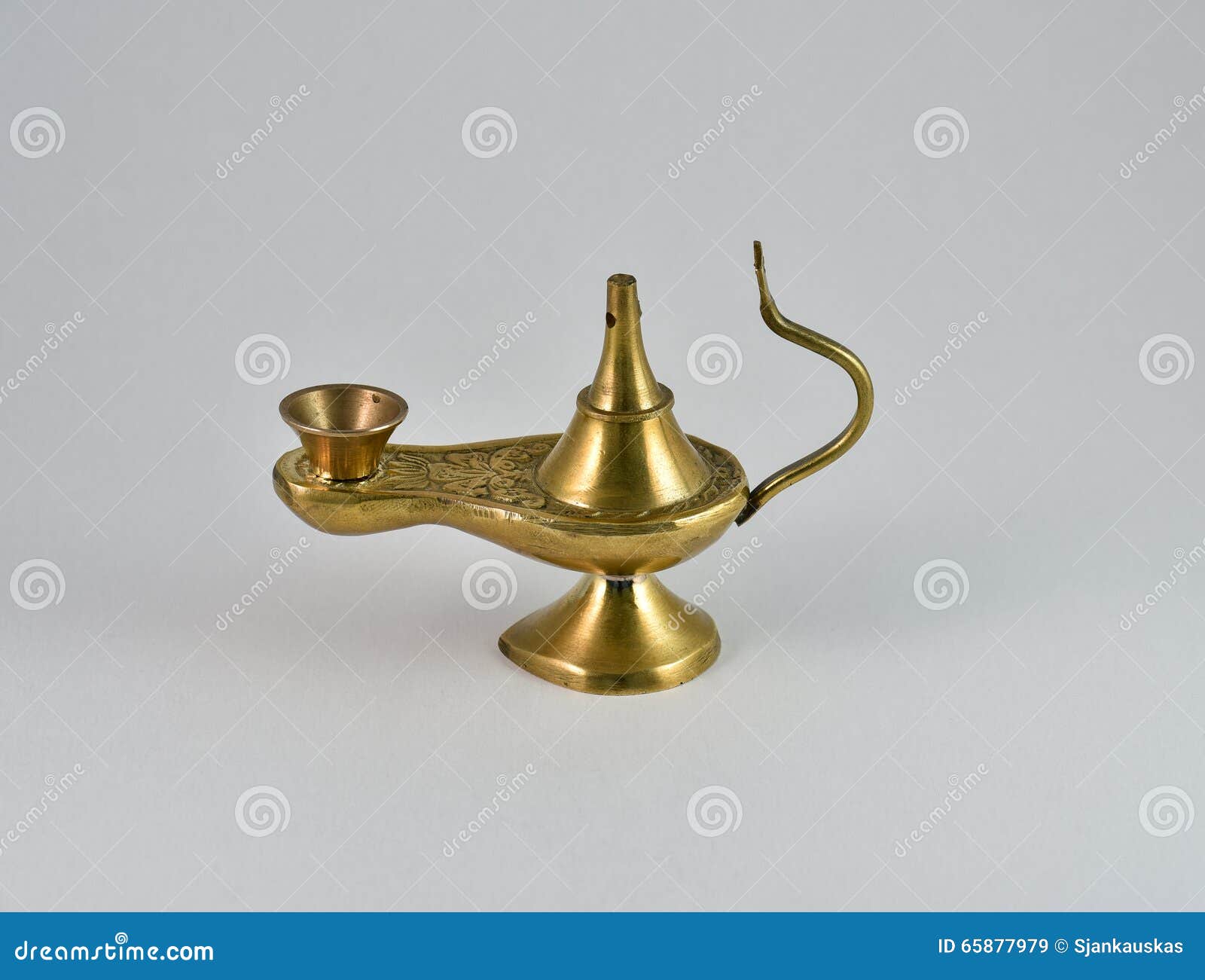 Ancient Aladdin's Magic Lamp. Silver Genie Lamp On Wooden Table. Old