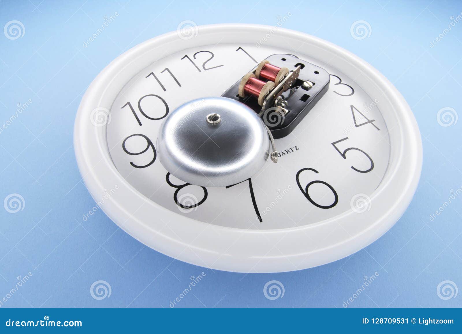 Alarm Bell on Wall Clock stock image. Image of signal 128709531