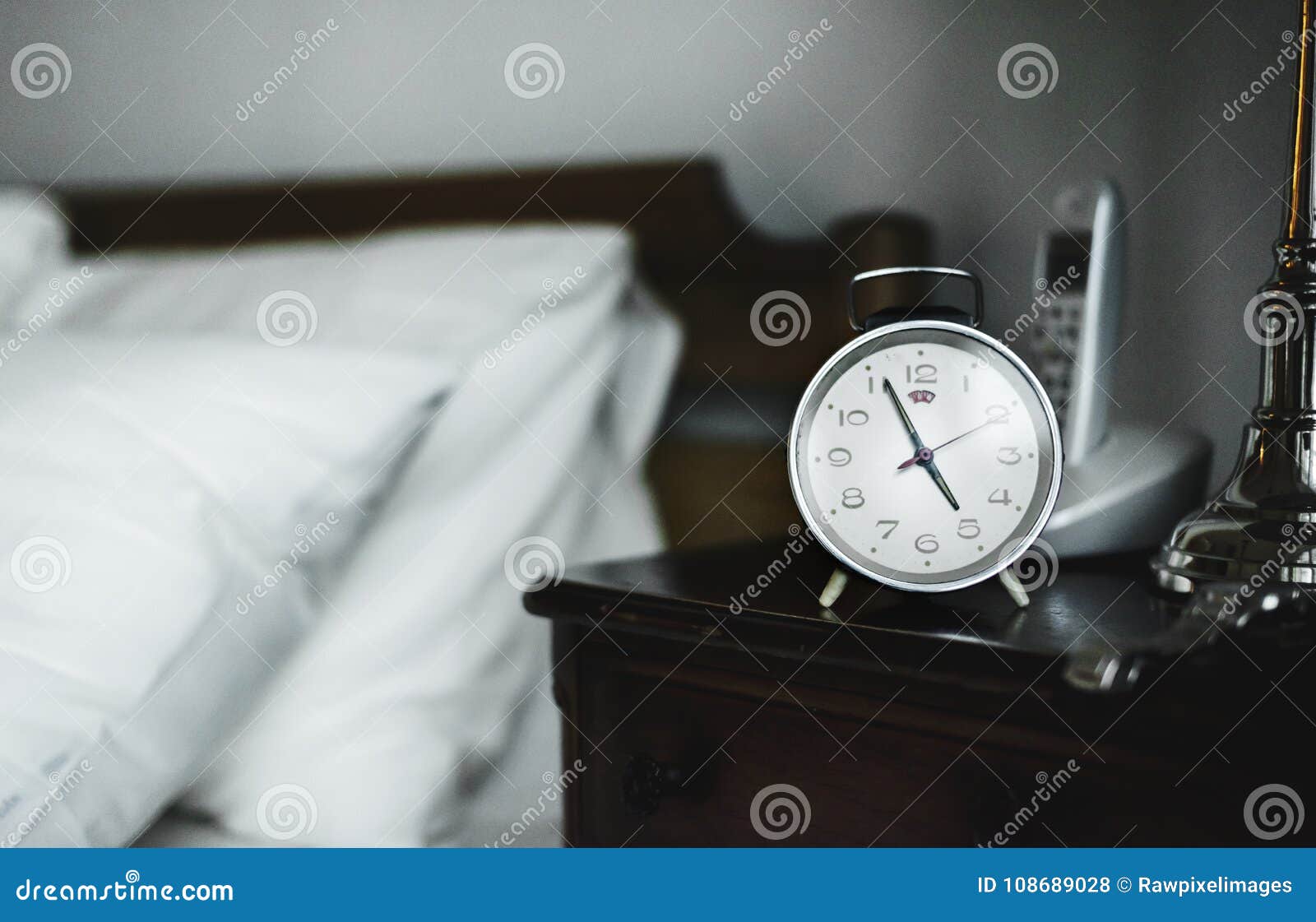 Alarm Clock on Bedside Table on Bedroom Stock Photo Image of empty, morning 108689028