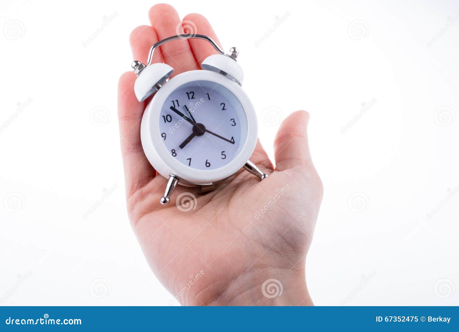 Alarm clock in hand stock image. Image of deadline, countdown 67352475
