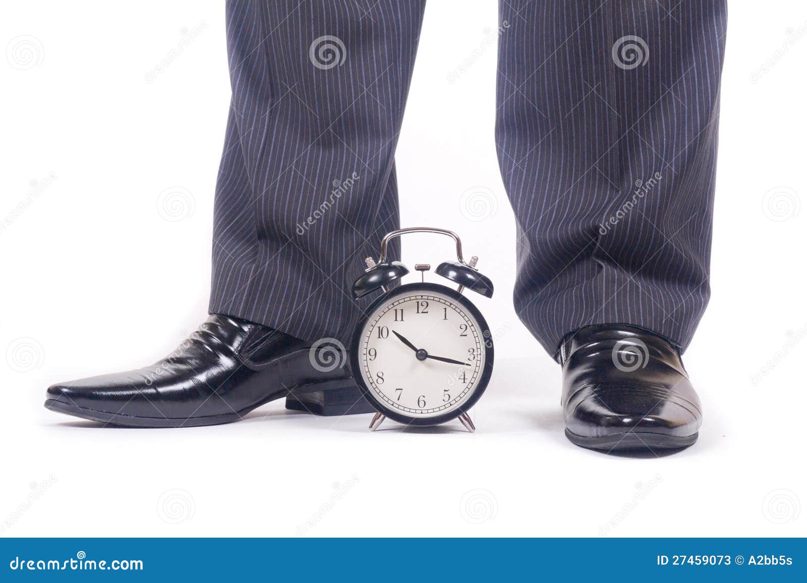 Alarm clock and legs stock image. Image of black, hourhand 27459073