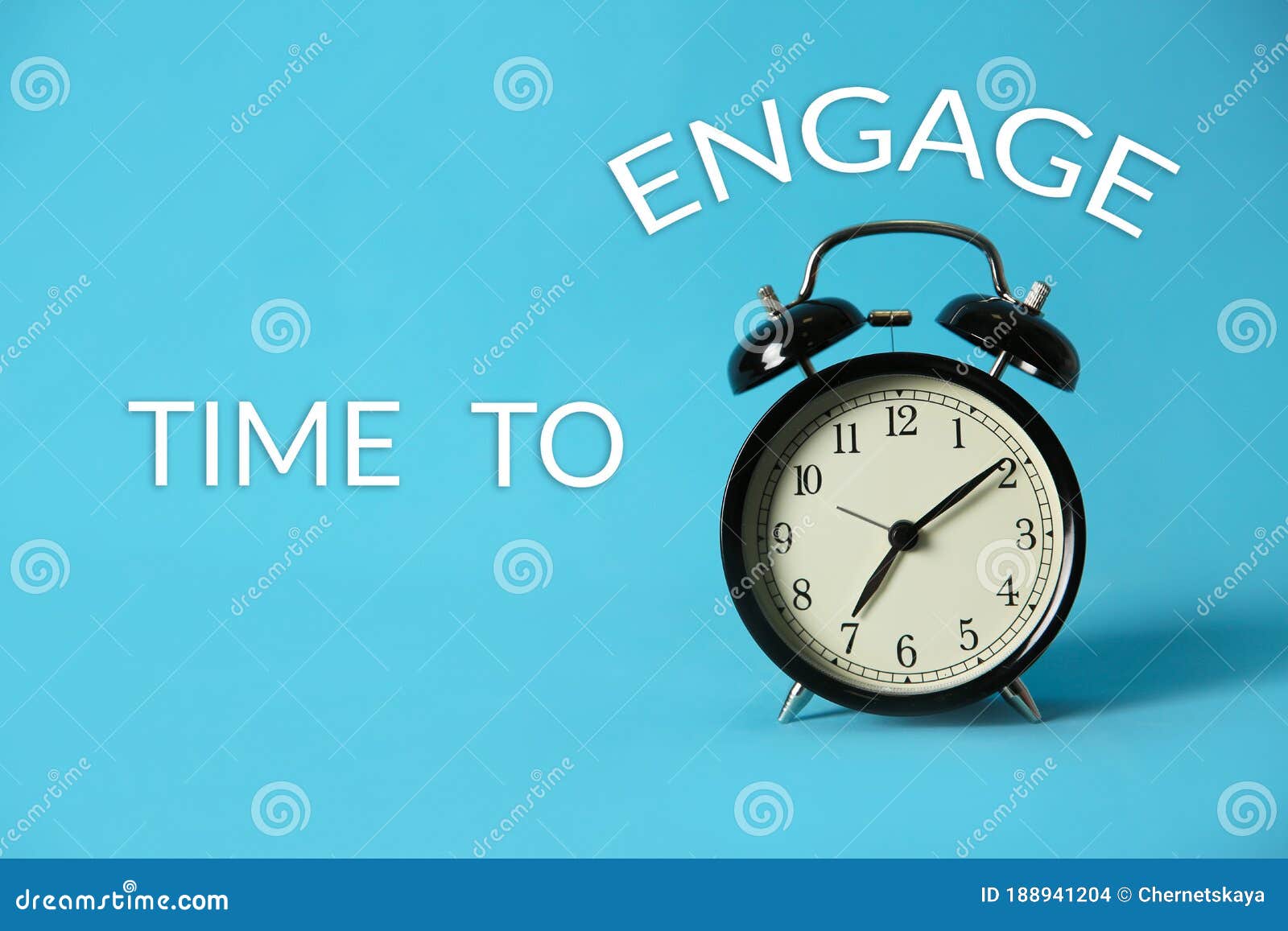 Alarm Clock and Phrase TIME TO ENGAGE on Blue Background Stock Photo