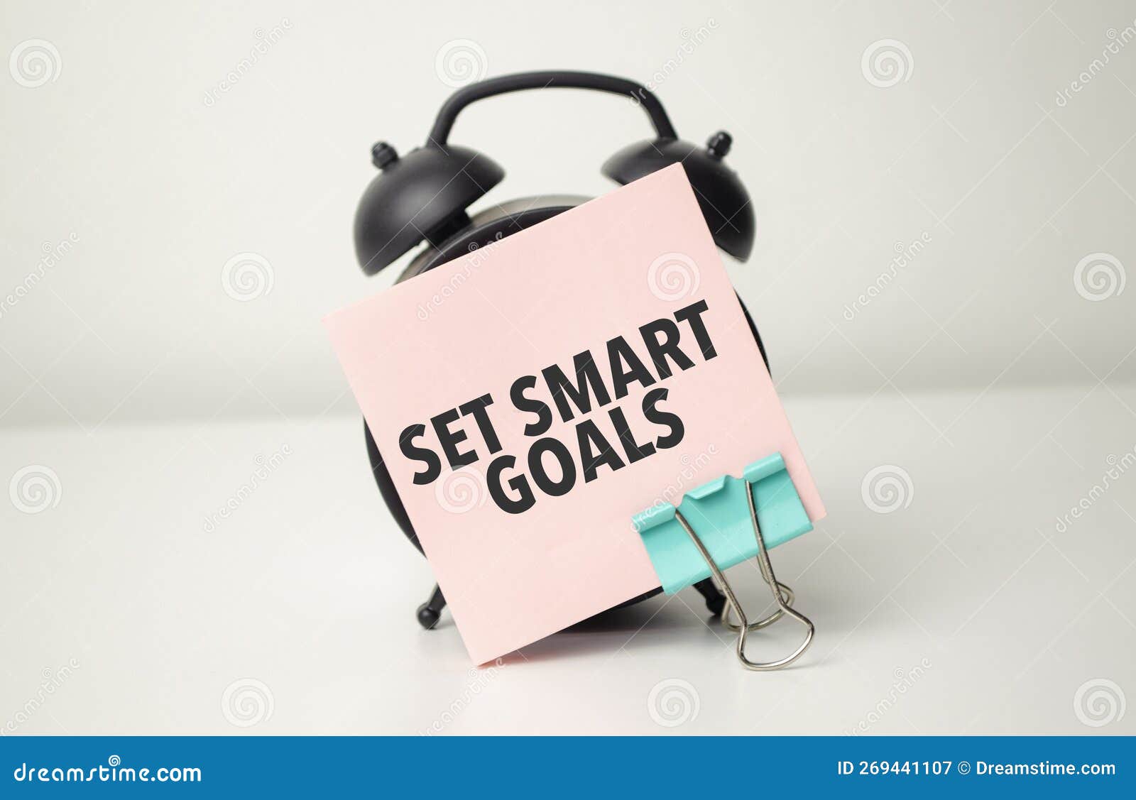 Alarm Clock with Pink Sticker with the Text Set Smart Goals Stock Image