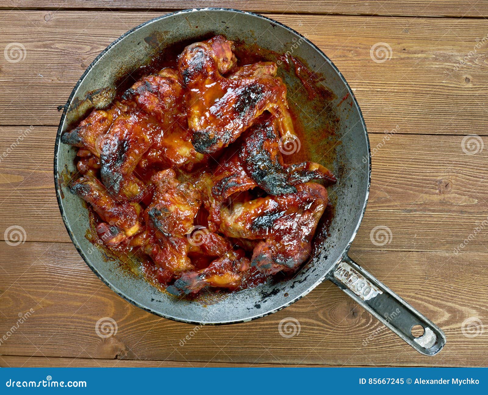 Alas De Pollo Italianas En Salsa Imagen de archivo Imagen de pimienta