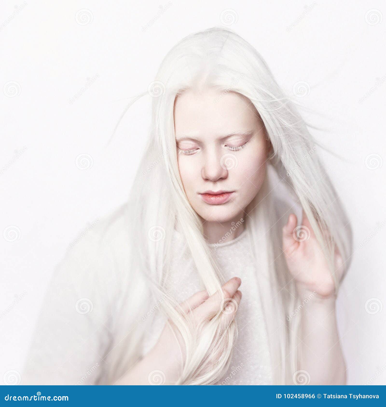 Albino Female with White Skin and White Long Hair. Photo Face on a