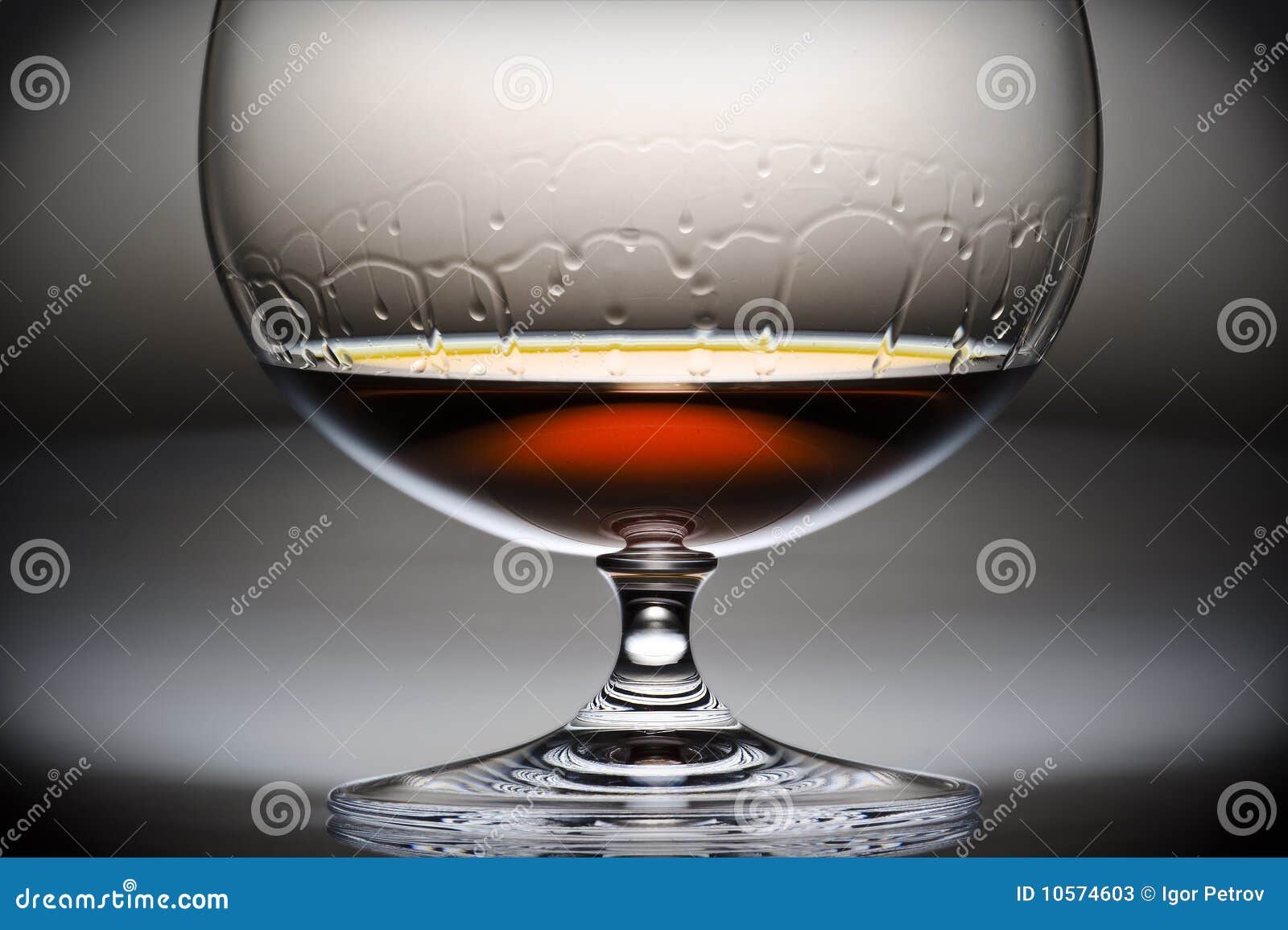 Alcohol in glass stock image. Image of liquor, orange 10574603