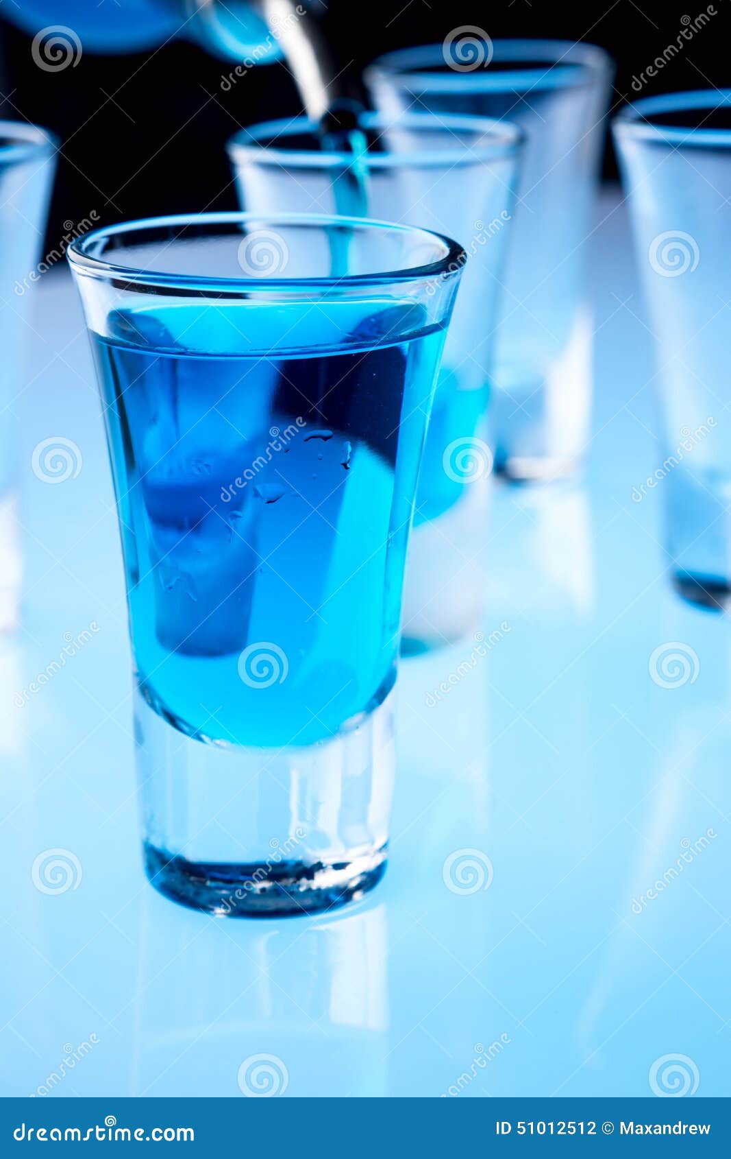 Alcohol in shot glasses stock photo. Image of beverage 51012512