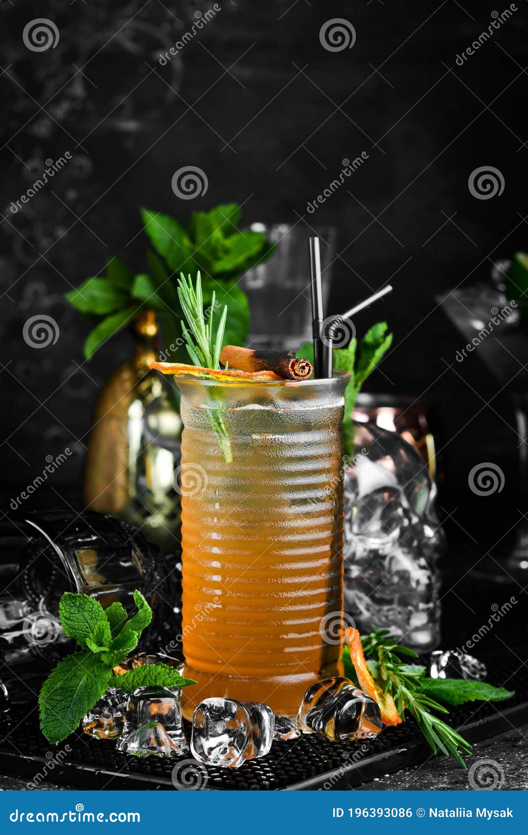 Alcoholic Cocktail with Orange Liqueur and Cinnamon. on a Black