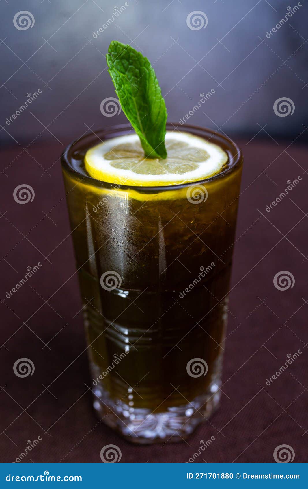 Alcoholic Drink with CocaCola and a Slice of Lemon in a Glass Stock