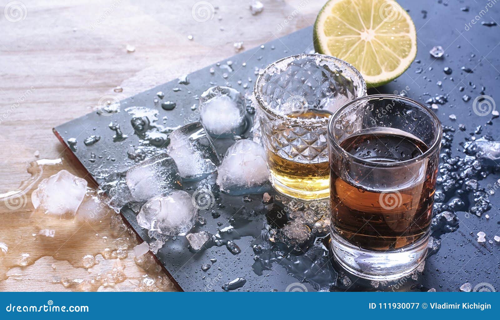 Alcoholic Strong Drinks on the Background and Pieces of Lime Stock Image Image of alcoholic